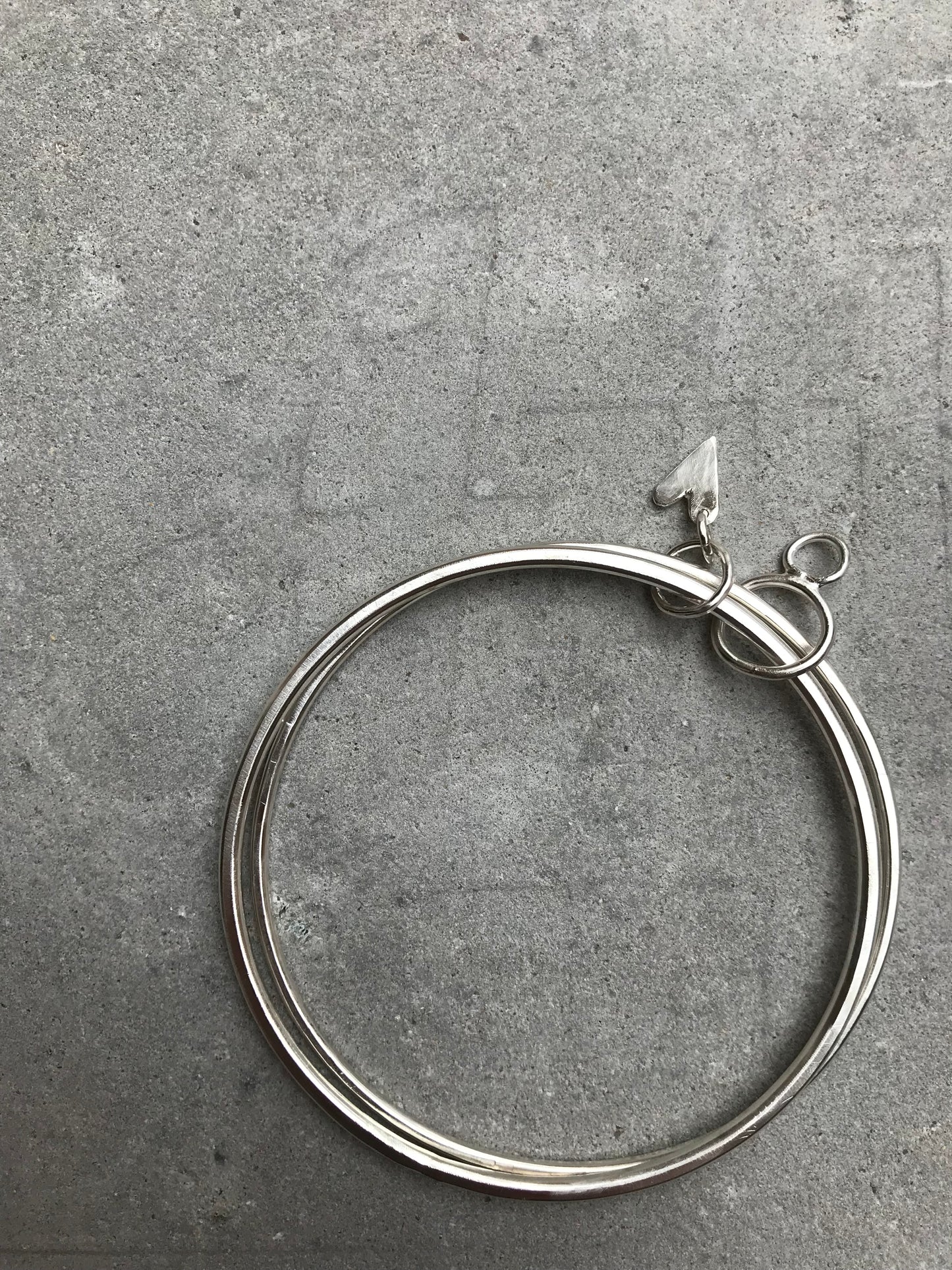 Sterling Silver Double Bangle with Heart and Hoops Charms.