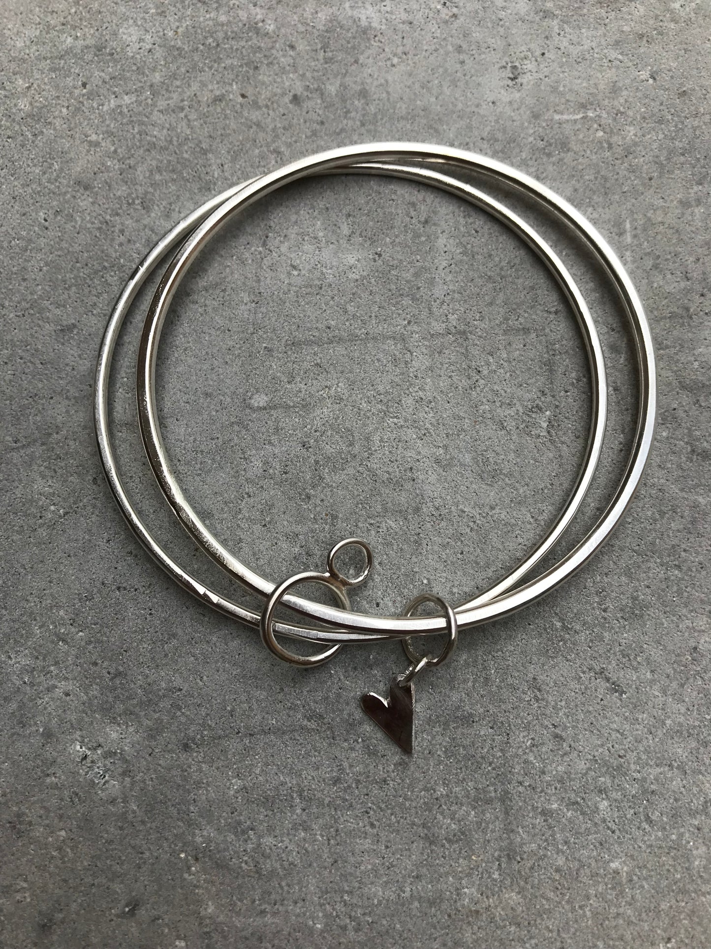 Sterling Silver Double Bangle with Heart and Hoops Charms.